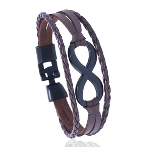 Multilayer brown braided leather infinity bracelet with a sleek black metal charm