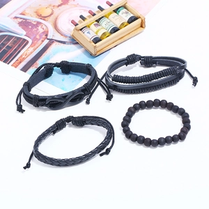 Set di 4 bracciali retrò in pelle nera intrecciata con simbolo infinito e perline