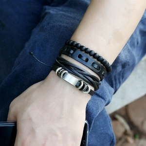 Men's retro punk leather bracelet set featuring multilayered woven bands and matte beads