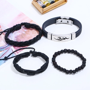 Set of four men's punk leather and stainless steel bracelets with tribal motifs and beads