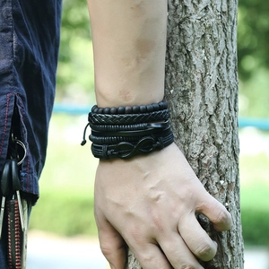 Set di 4 bracciali vintage in pelle nera da uomo con ciondolo a simbolo dell'infinito