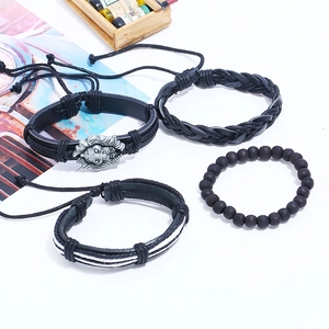 Men's 4-piece black leather bracelet set with retro silver lion head and matte beads