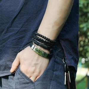 Men's retro ethnic leather bracelet set with wood beads and tribal flame metal detail