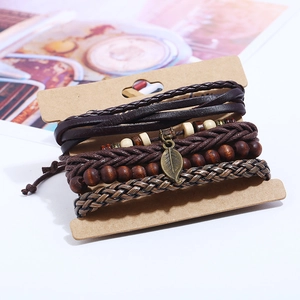 Multi-layer vintage leather bracelet set with bronze leaf charm on display card