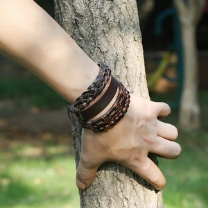 Retro multi-layer woven leather bracelet set with dark brown ropes and red beads