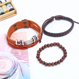 Set of 3 vintage men's bracelets featuring brown leather, woven ropes, and round wooden beads