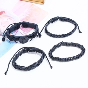 Men's retro punk four-piece black leather bracelet set with skull charm and woven ropes