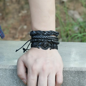 Men's punk layered leather bracelet set featuring skull anchor charm and braided ropes