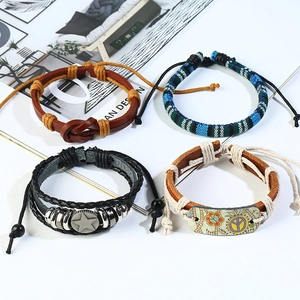 Set of 4 vintage braided leather bracelets for men with bohemian metal star charms