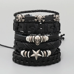 Retro punk black leather bracelet set with silver skull and star charms in multi-layer style