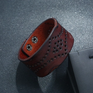 Retro wide hollowed-out brown leather wristband bracelet with adjustable metal snaps