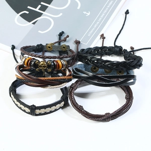 Retro multi-layer braided leather bracelet set for men featuring skull charms and beads