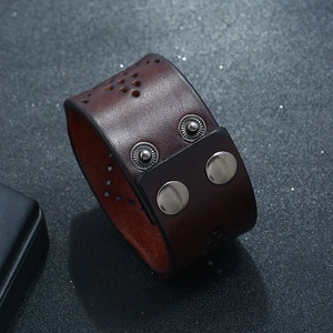 Retro wide brown leather bracelet for men with hollow pattern and adjustable metal snaps