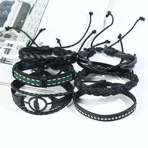 Retro 6-piece woven leather bracelet set with feather charm and green striped band