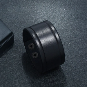 Vintage black leather punk bracelet for men with wide band and snap button closure