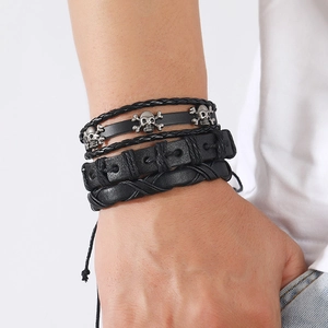 Men's punk multi-layer woven leather bracelet set featuring silver skull charms