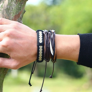 Vintage woven leather bracelet set for men featuring ethnic braided layers and casual style