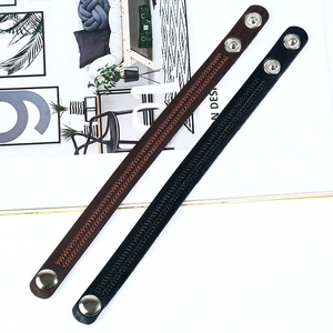 Retro leather wristband with embroidery stitching and adjustable snap buttons