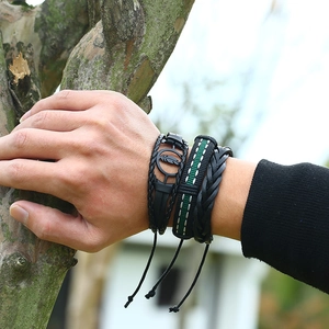 Three-piece men's vintage leather bracelets with feather metal charm and woven texture