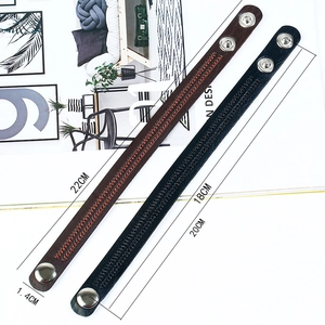 Detail view of woven pattern leather bracelet with adjustable metal snap buttons