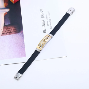 Men's titanium steel bracelet with black silicone strap and gold-silver hollow leaf insert