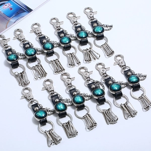 Set of 12 zodiac leather keychains with galaxy glass dome and multiple hooks on white back