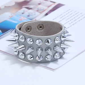 Punk wide grey leather bracelet featuring three rows of metallic silver spikes