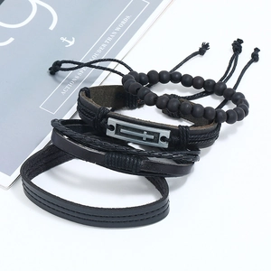 Retro multi-layer black leather bracelet set for men featuring a metal cross and wooden beads