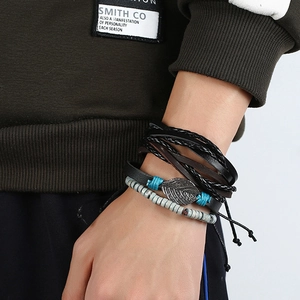 Men's retro layered bracelet set with leather cords and vintage metal leaf charm