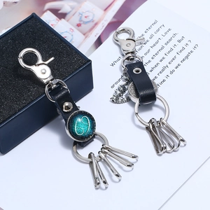 Deep blue leather zodiac keychain set with Cancer sign star glass and silver hooks