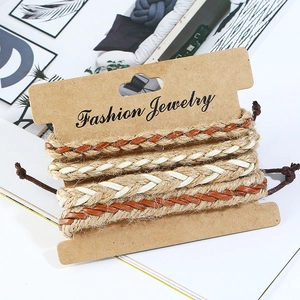 Lot de quatre bracelets vintage en corde de chanvre tressée pour hommes sur carte mode