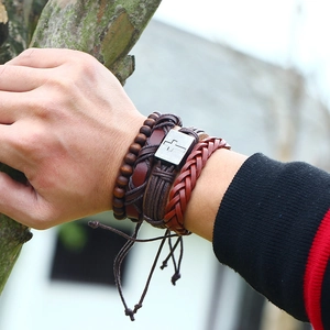 Bohemian style set of 4 handmade woven leather bracelets with cross and wood beads
