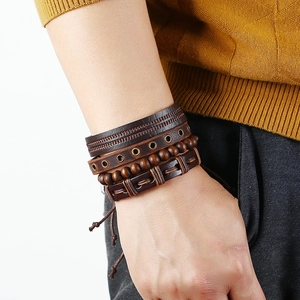 Retro multi-layer leather bracelet set with woven bands and wooden beads on wrist