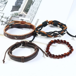 Vintage 4-piece set of brown braided leather bracelets with punk rivets and amber beads