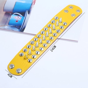 Yellow punk leather bracelet with silver metal spikes and adjustable snap buttons