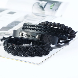Retro black leather bracelet set for men featuring a metal plate with believe engraving