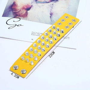 Punk yellow leather bracelet with silver metal studs and double snap button closure