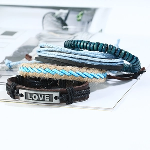 Retro 4-piece woven leather bracelet set for men featuring wood beads and LOVE metal tag