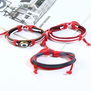3-piece set of woven leather bracelets with evil eye charm and adjustable ropes