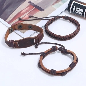 Three-piece vintage leather bracelet set for men with woven cords and bronze metal clasp