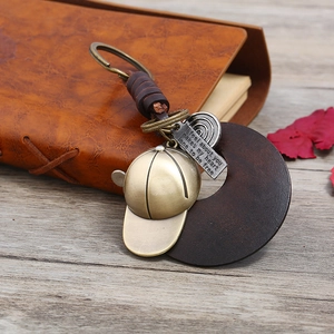 Retro braided leather keychain with bronze cap pendant and engraved inspirational tag