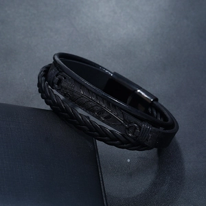 Men's double-layer black leather bracelet with feather embossed band and magnetic clasp