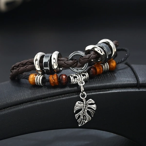Men's multilayer leather bracelet with woven cord and vintage silver leaf pendant
