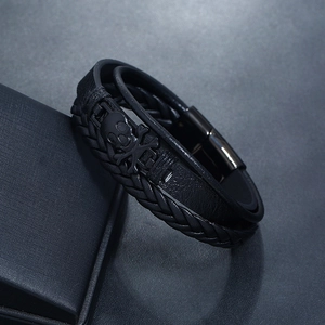 Men's black multilayer braided leather bracelet with skull charm and magnetic clasp