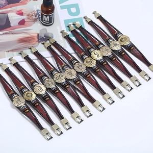 Handmade woven leather zodiac bracelet with 12 constellation metal charms in vintage gold finish