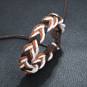 Retro handmade braided leather bracelet with multi-color cords in a bohemian style