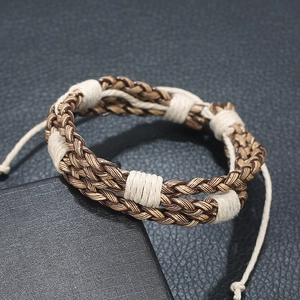 Vintage woven leather bracelet for men with brown and cream braided cords and adjustable tie