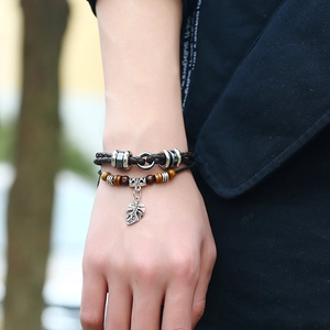 Men's double-layered leather braided bracelet with tiger eye beads and leaf pendant charm