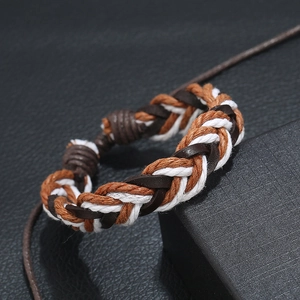 Handcrafted woven leather bracelet with brown hemp and black cord in a punk vintage style
