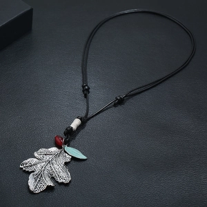 Retro leaf pendant long necklace with red bead on black leather cord, vintage style accessory